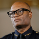 Dallas Police Chief David Brown briefs the media about a shooting at Dallas Police headquarters, Saturday, June 13, 2015, in Dallas. At least one gunman opened fire on officers outside of police headquarters in Dallas early Saturday, spraying squad cars with bullets before fleeing in a van, which officers followed to a suburban parking lot and surrounded, beginning a standoff, Brown said. (AP Photo/Tony Gutierrez)